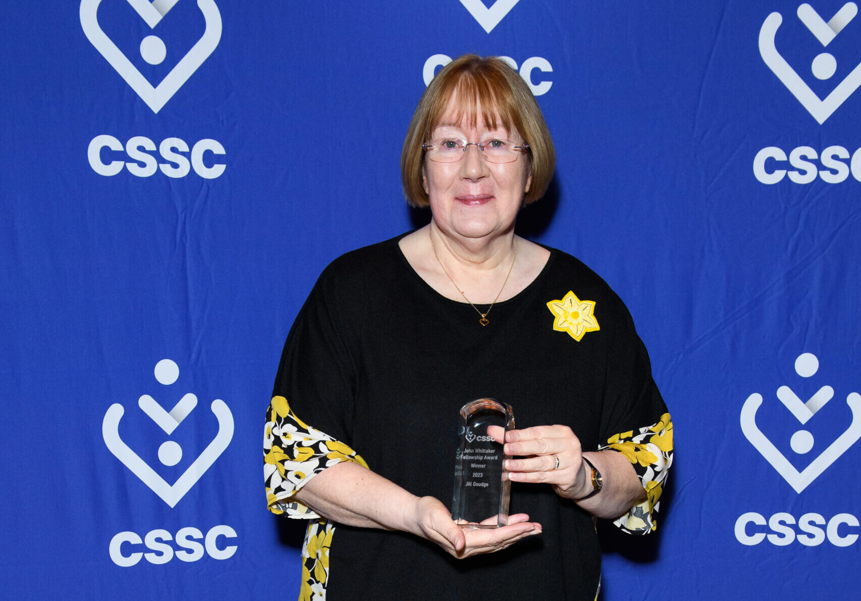 Bridgend community hero recognised for 20 years service at