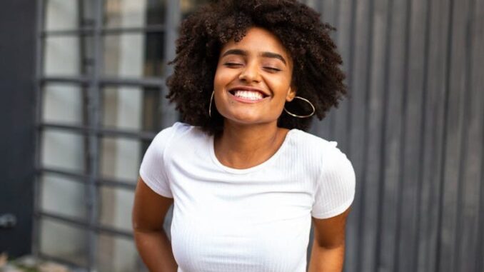 Photo of Woman Wearing White Shirt